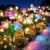 BUCASA Firefly-Solarleuchten für den Garten im Freien, 4 Stück, 36 LEDs, helle Solarleuchten für den Außenbereich mit warmweißen Glühwürmchen und farbigen Lilienblüten, verbesserte schwingende Solar-Gartenleuchten für Wege, Hof, Balkon